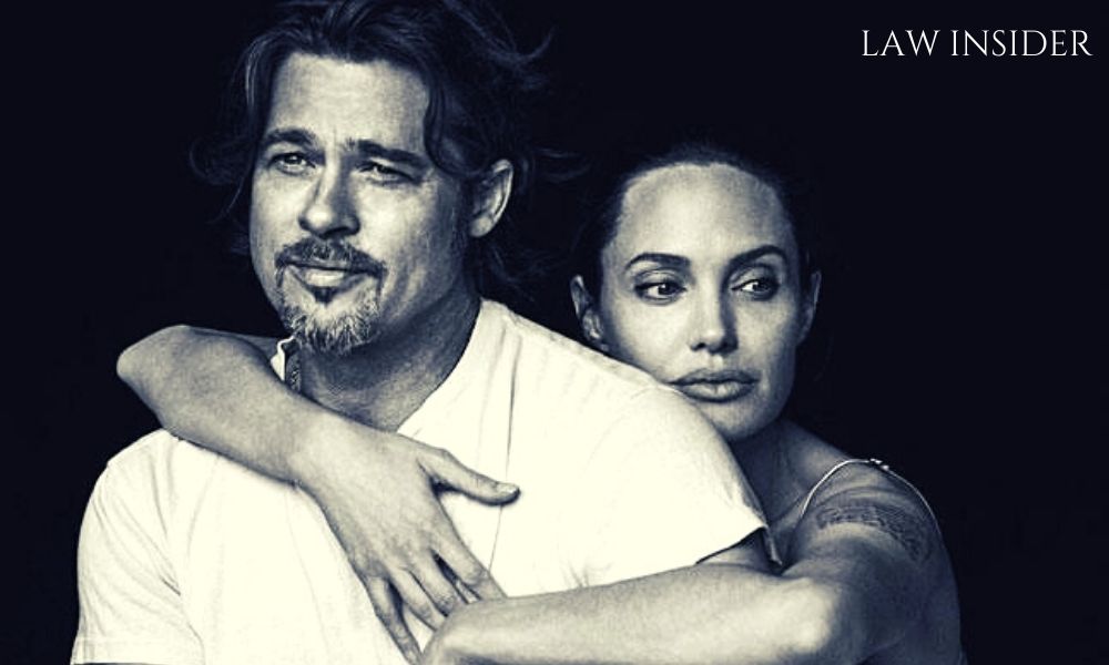 Angeline Jolie & Brad Pitt, Angeline hugging Brad Pitt from behind